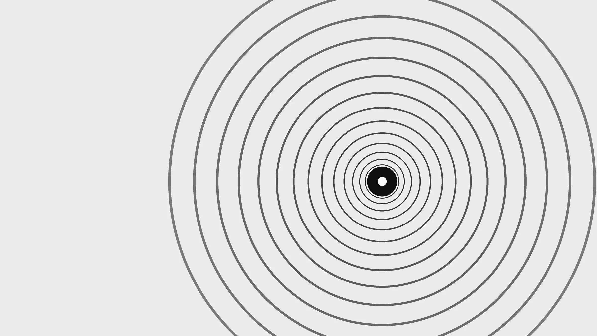 Concentric rings spreading out from a single bright point, drawn in black on pale grey