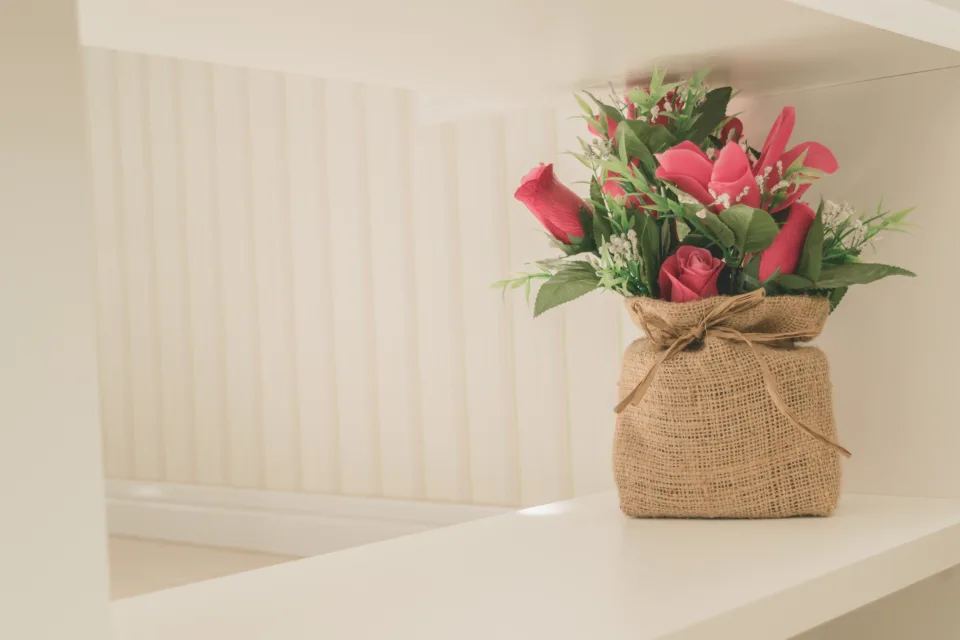 A calm display of flowers in a neutral room